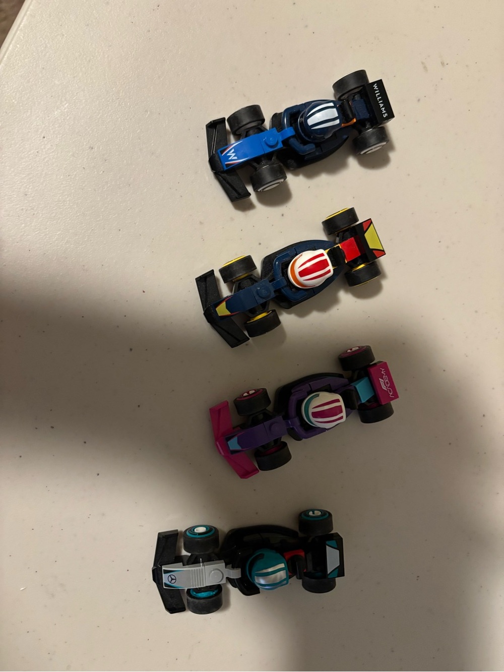 Lego F1 Minifigs Style Mini Race Car Pack - Assorted Blue, Purple, Black, Pink